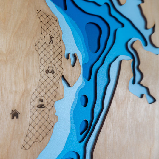 A handcrafted wooden map of the Bay of Islands displayed in a modern living room, acting as a unique and personalised housewarming gift.