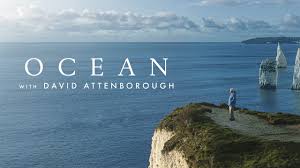 Image of David Attenborough with ocean backdrop Sir David Attenborough standing in front of ocean footage from the Ocean documentary (2025)