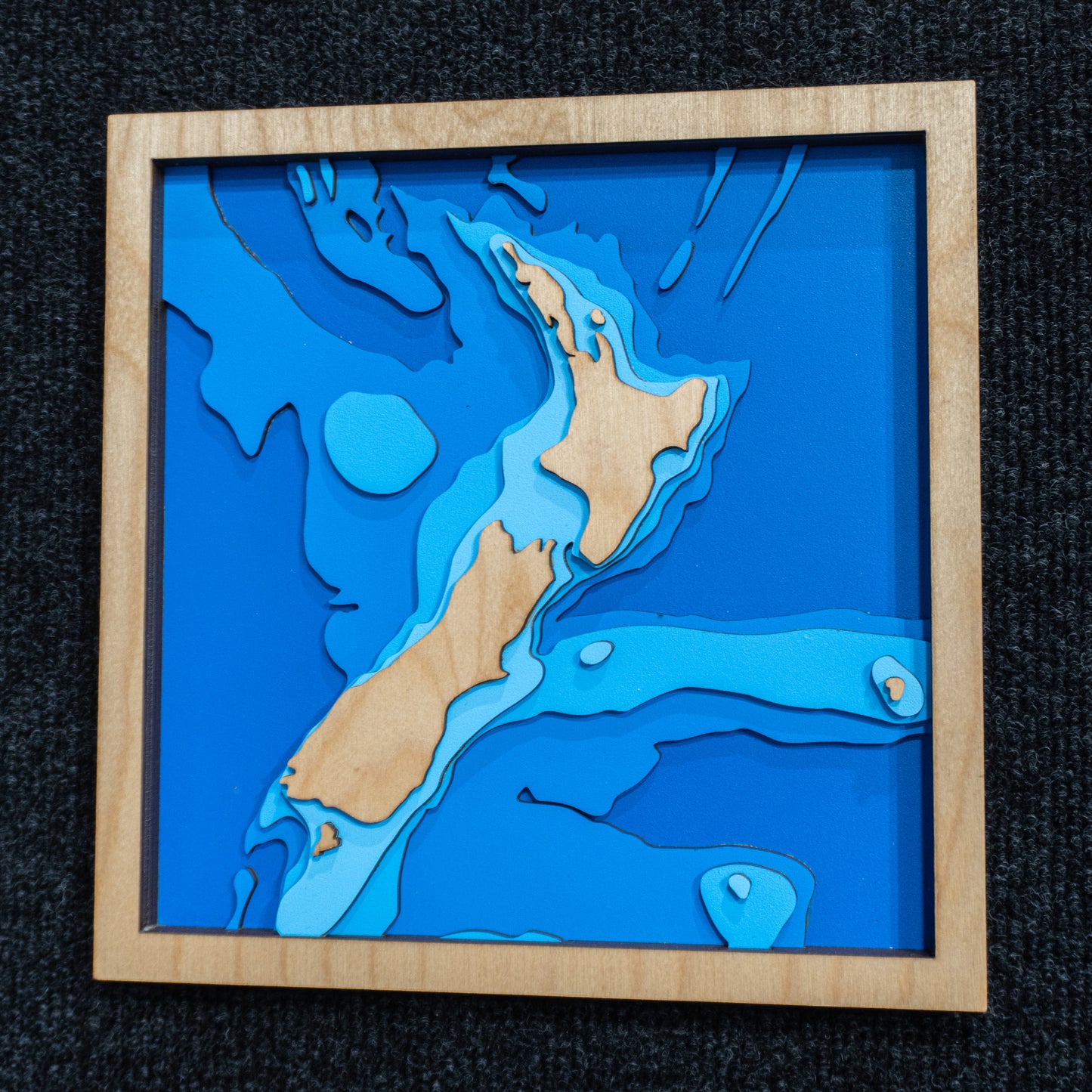 New Zealand mini wooden depth map - 22cm square, laser-cut layered map by Tides Out Maps