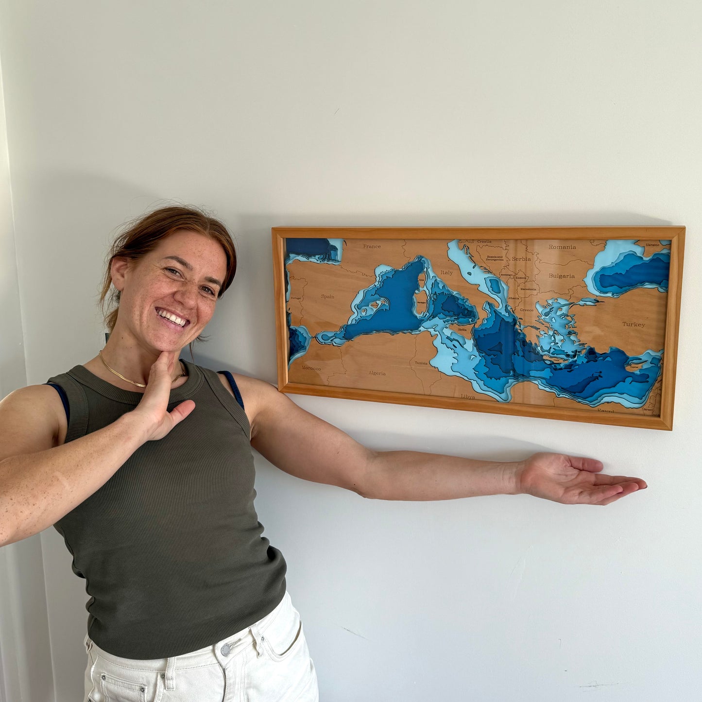 Detailed close-up of the Europe - Mediterranean Sea wooden map, highlighting the precision-cut layers and intricate detailing of the region's topography and surrounding seas.