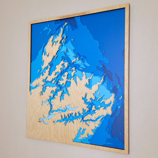Extra-large handcrafted wooden depth map of Marlborough Sounds, New Zealand, featuring laser-cut European Birch layers illustrating sea depths from sea level to -250 meters, highlighting the region's intricate coastline and bathymetric contours.